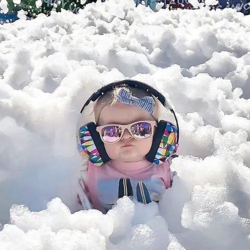 Girl With Headphones In Foam